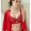 A model wearing the vibrant Bright Red luxury lace embroidered bra set with a matching red satin robe, highlighting the wire-free push-up 3/4 cup support design,