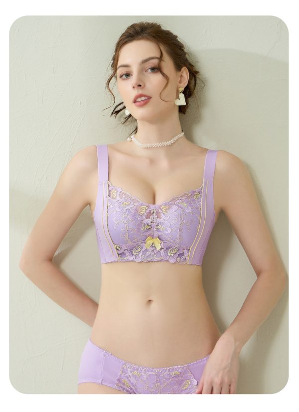 Front view of the Light Purple luxury correction bra set on a model, highlighting the wide, fixed double shoulder straps and high side-wing breast collection coverage,