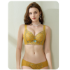 A model presenting the Ginger Yellow lace embroidered bra suit with a dainty center bow, showcasing the thin-upper-thick-lower molded push-up cup structure,